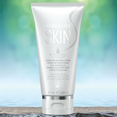 Herbalife SKIN Instant Reveal Berry Scrub tube on a serene background, showcasing its exfoliating properties.