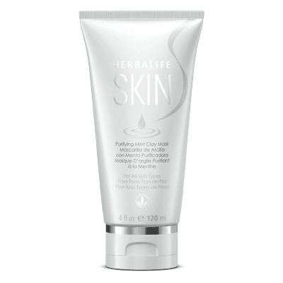 Purifying Mint Clay Mask for Clearer, Smooth Skin in a silver tube by Herbalife, suitable for all skin types.